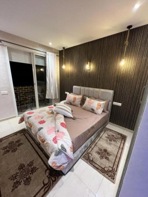 Guelizma's Luxury studio Agadir Self Check In 15 Mins to Marina Beach Free Parking .